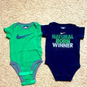 Nike boys 2 bodysuits. Used- good condition. 6/9M